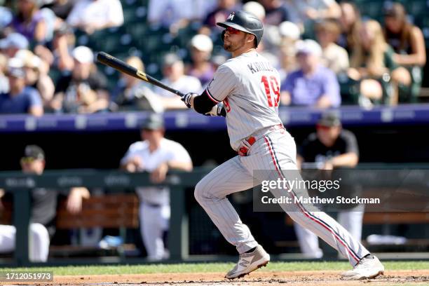 Alex Kirilloff of the Minnesota Twins hits a RBI single against the Colorado Rockies in the second inning at Coors Field on October 01, 2023 in...