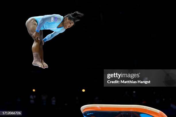 Simone Biles of Team United States performs her new jump routine 'Biles II' Yurchenko double pike vault on Vault during Women's Qualifications on Day...