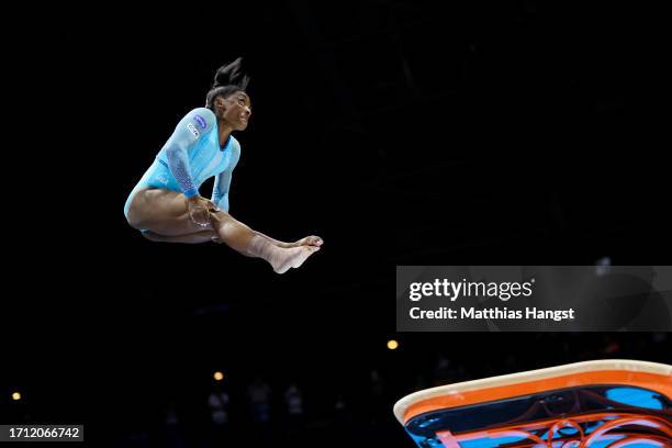 Simone Biles of Team United States performs her new jump routine 'Biles II' Yurchenko double pike vault on Vault during Women's Qualifications on Day...