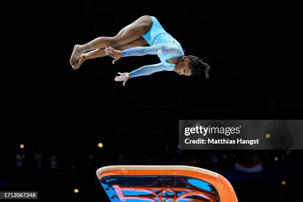 Simone Biles of Team United States performa her new jump routine 'Biles II' on Vault during Women's Qualifications on Day Two of the FIG Artistic...