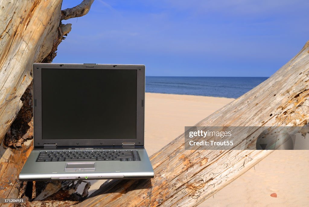 Beach Box Computer Laptop On The Beach High-Res Stock Photo - Getty Images