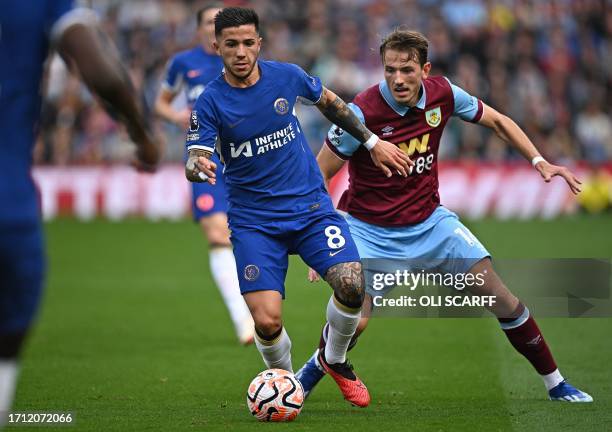 Burnley's Norwegian midfielder Sander Berge vies with Chelsea's Argentinian midfielder Enzo Fernandez during the English Premier League football...