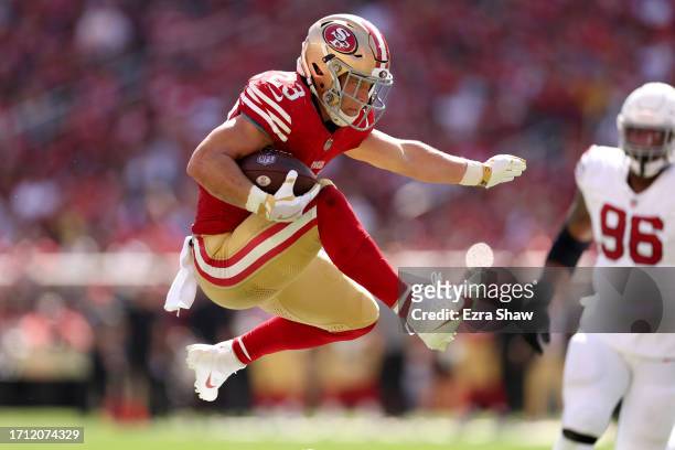 Christian McCaffrey of the San Francisco 49ers runs for touchdown against the Arizona Cardinals during the second quarter at Levi's Stadium on...