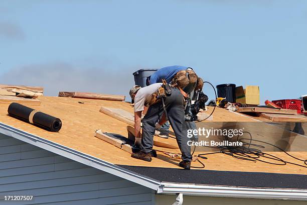 getting new shingles - roof installation stock pictures, royalty-free photos & images