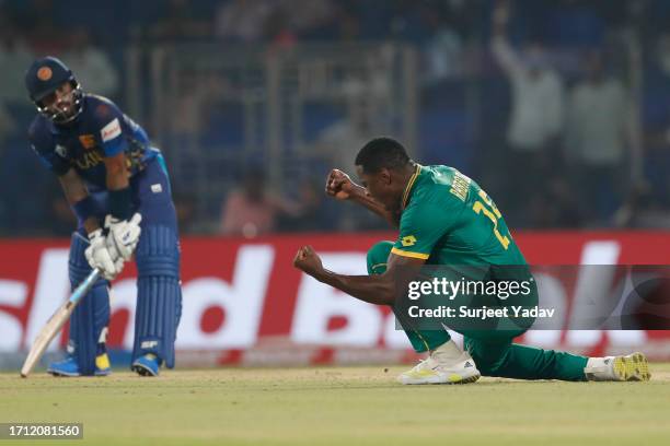 Kagiso Rabada of the South Africa celebrates after taking the wicket of Kusal Mendis of the Sri lanka during the ICC Men's Cricket World Cup India...