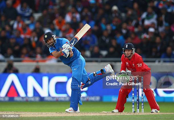 Virat Kohli of India hits out during the ICC Champions Trophy Final match between England and India at Edgbaston on June 23, 2013 in Birmingham,...