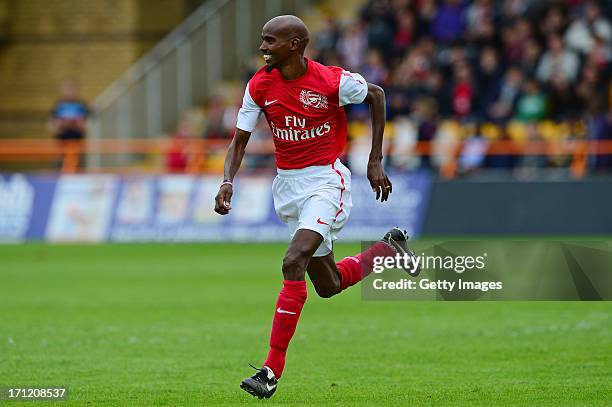 Mo Farah of Arsenal Legends XI in action during the charity football match between Arsenal Legends XI and World Refugee Internally Displaced Persons...