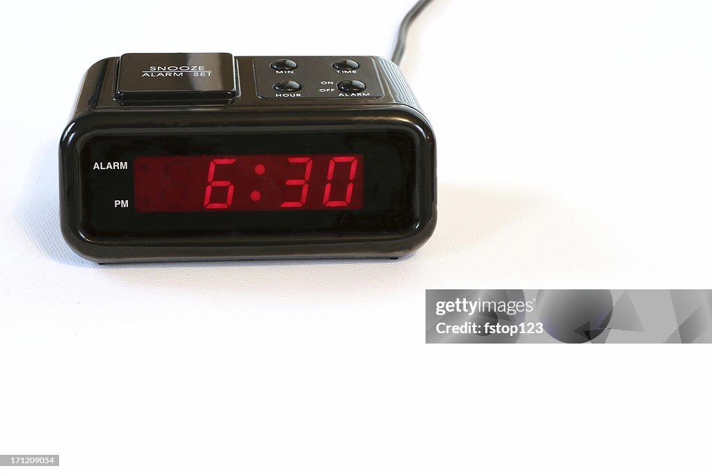 Time. Alarm Clock isolated on white. 6:30 am. Early morning.