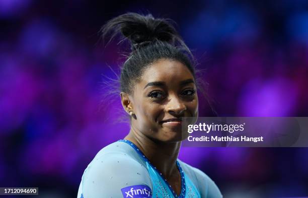 Simone Biles of the Team United States reacts during Women's Qualifications on Day Two of the FIG Artistic Gymnastics World Championships at the...