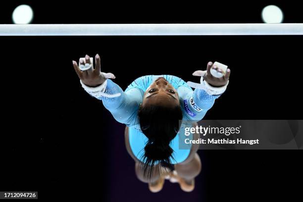 Simone Biles of Team United States in action on Uneven Bars during Women's Qualifications on Day Two of the FIG Artistic Gymnastics World...