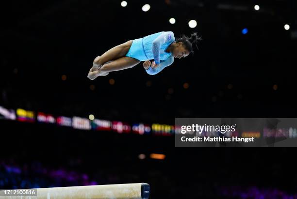 Simone Biles of the Team United States competes on Balance Beam during Women's Qualifications on Day Two of the FIG Artistic Gymnastics World...