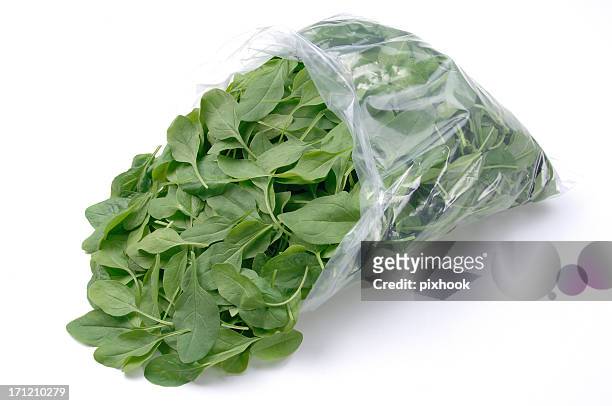 spinach - lunch bag white background stock pictures, royalty-free photos & images