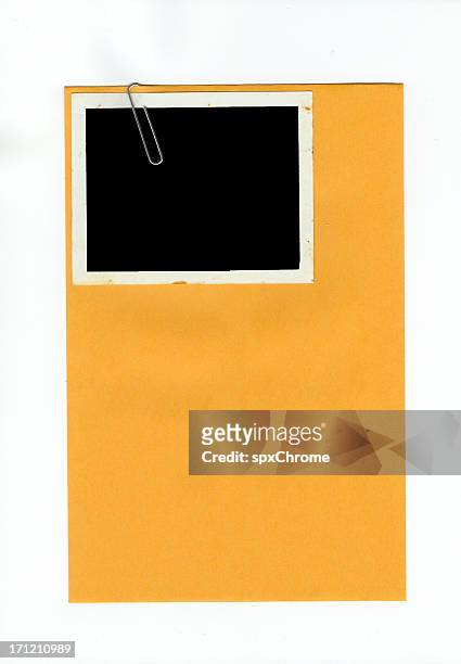 envelope with photo attached by paper clip - paper clip stock pictures, royalty-free photos & images