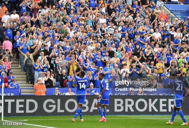 Fans of Leicester City react after Kelechi Iheanacho of Leicester City scored the opening goal for Leicester City during the Sky Bet Championship...