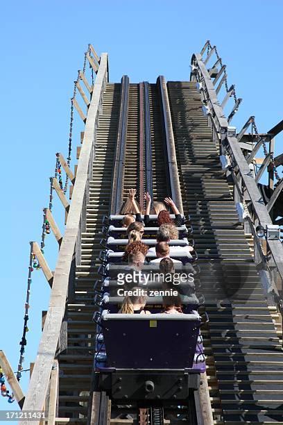 reaching the summit - anticipation rollercoaster stock pictures, royalty-free photos & images