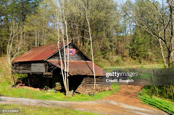 confederate flag on country home - confederate flag stock pictures, royalty-free photos & images