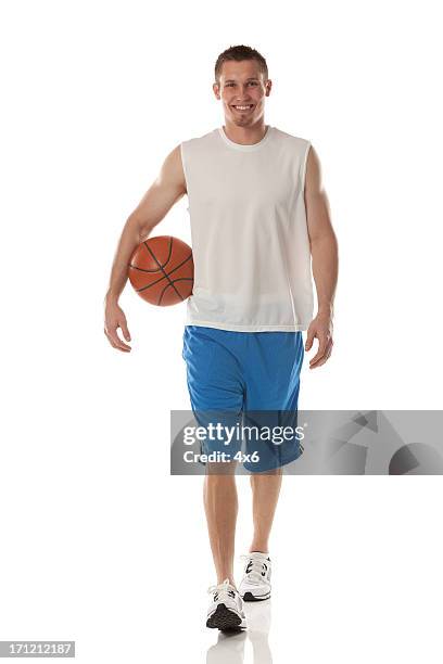 sportsman porter un joueur de basket - basketteur photos et images de collection