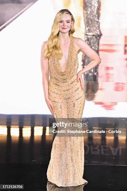 Elle Fanning walks the runway during "Le Défilé L'Oréal Paris - Walk Your Worth" Show as part of Paris Fashion Week at the Eiffel Tower on October...