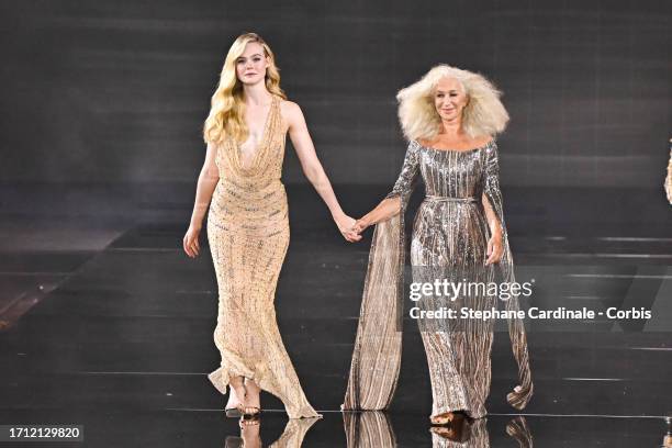 Elle Fanning and Helen Mirren walk the runway during "Le Défilé L'Oréal Paris - Walk Your Worth" Show as part of Paris Fashion Week at the Eiffel...