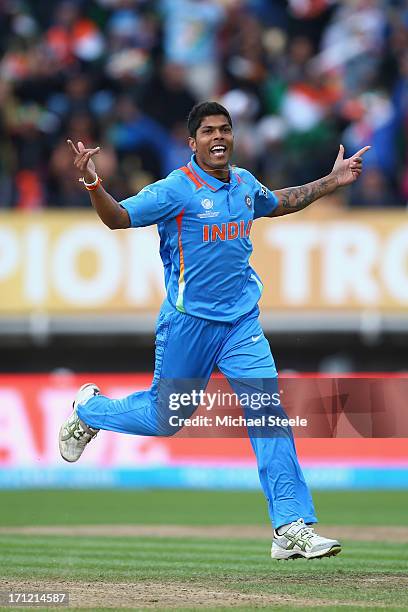 Umesh Yadav of India celebrates taking the wicket of Alastair Cook of England during the ICC Champions Trophy Final match between England and India...