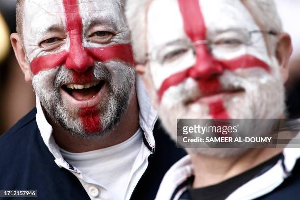 English supporters pose prior to the France 2023 Rugby World Cup Pool D match between England and Samoa at the Stade Pierre-Mauroy in...