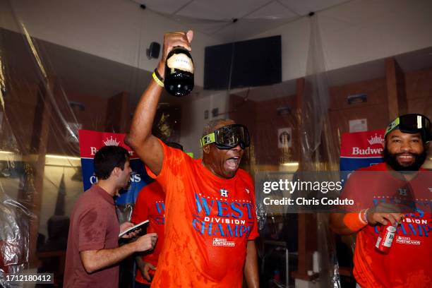 Manager Dusty Baker Jr. #12 of the Houston Astros celebrates after the Astros defeated the Arizona Diamondbacks 8-1 to win the American League West...