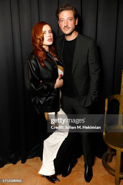 Bella Thorne and Mark Emms attend the amfAR Paris Fashion Week Cocktail Party at Sinner Paris on October 01, 2023 in Paris, France.