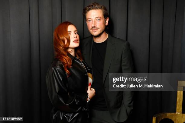 Bella Thorne and Mark Emms attend the amfAR Paris Fashion Week Cocktail Party at Sinner Paris on October 01, 2023 in Paris, France.