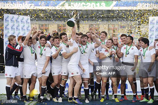 England's captain Jack Clifford holds the trophy surrounded by teammates after winning the IRB Junior World Championship final against Wales on June...