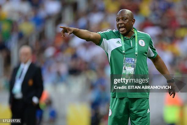Nigeria's coach Stephen Keshi gives instruction during the FIFA Confederations Cup Brazil 2013 Group B football match against Spain, at the Castelao...