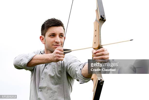 bussinesman with bow and arrow - bow arrow stock pictures, royalty-free photos & images