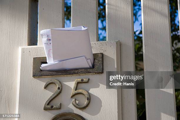 mail delivered - junk mail stock pictures, royalty-free photos & images