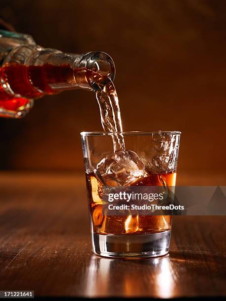 whisky on rock - whiskey stock pictures, royalty-free photos & images