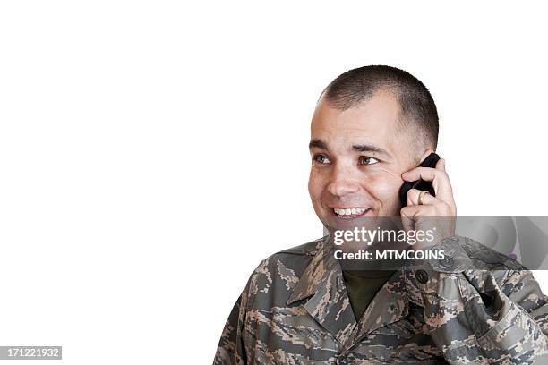 happy airman on cell phone - mtmcoins stockfoto's en -beelden