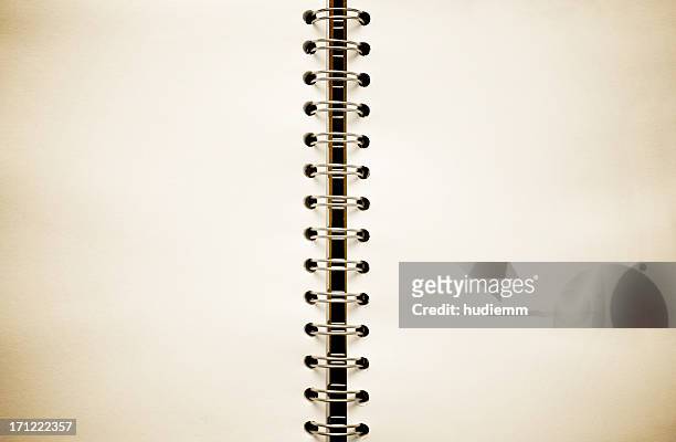 old spiral notebook - schetsblok stockfoto's en -beelden