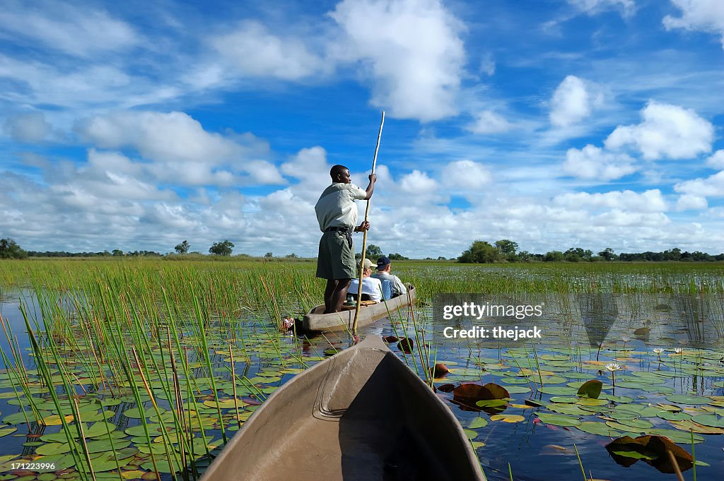 People in a boat in the Mokoro