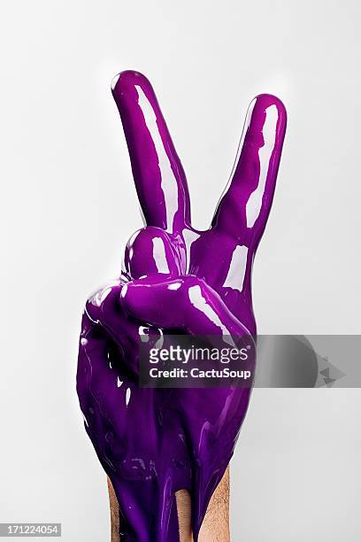 painted hand - peace sign gesture stock pictures, royalty-free photos & images