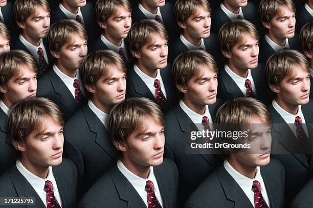 businessman production - cloning stock pictures, royalty-free photos & images