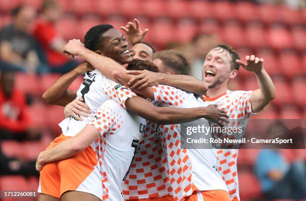 Blackpool's Karamoko Dembele celebrates scoring his side's second goal during the Sky Bet League One match between Charlton Athletic and Blackpool at...