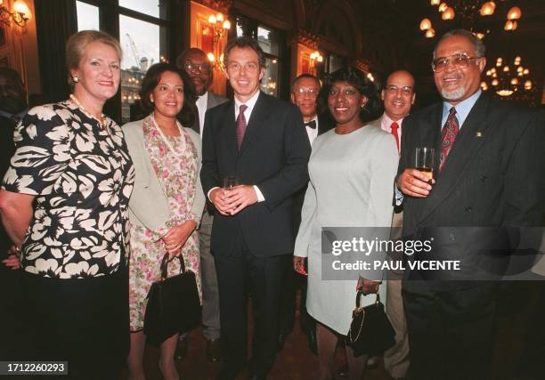 British Prime Minister Tony Blair with The High Commissioners, Sheila de Osnne of Trinidad and Tobago Ursula Barrow of Belize, George Williams of the...