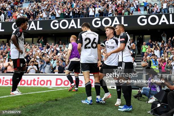 Tom Cairney of Fulham celebrates scoring their 2nd goal during the Premier League match between Fulham FC and Sheffield United at Craven Cottage on...