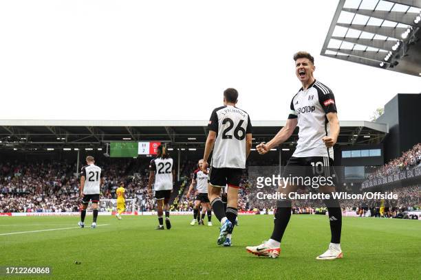 Tom Cairney of Fulham celebrates scoring their 2nd goal during the Premier League match between Fulham FC and Sheffield United at Craven Cottage on...