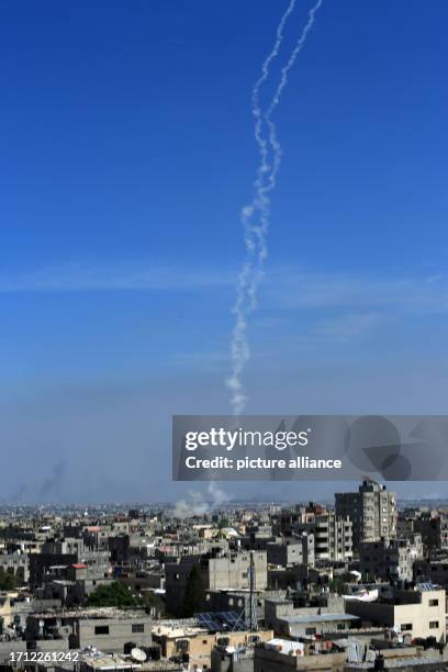 October 2023, Palestinian Territories, Rafah: Hamas fires a large number of rockets towards Israel in the city of Rafah in the southern Gaza Strip....