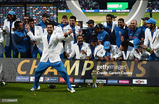 Virat Kohli of India celebrates victory with team mates during the ICC Champions Trophy Final between England and India at Edgbaston on June 23, 2013...