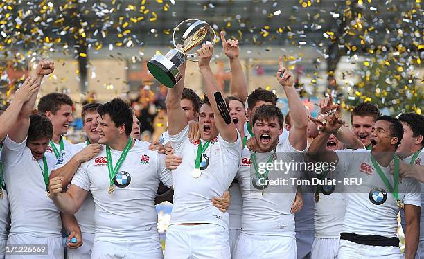 England players celebrate with the trophy after winning the IRB Junior World Championship Final match between England U20 and Wales U20 at Stade de...