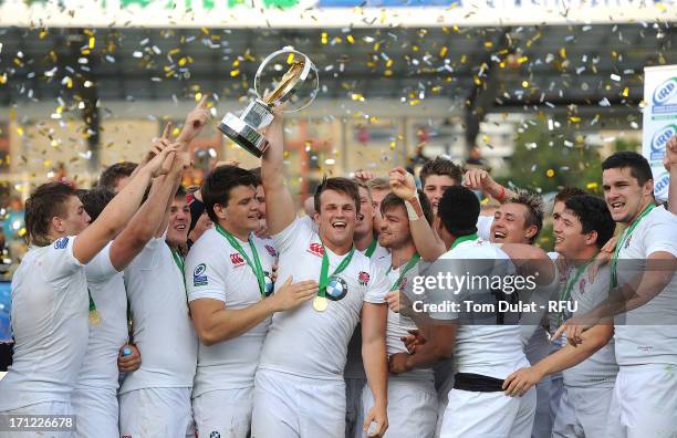 England players celebrate with the trophy after winning the IRB Junior World Championship Final match between England U20 and Wales U20 at Stade de...