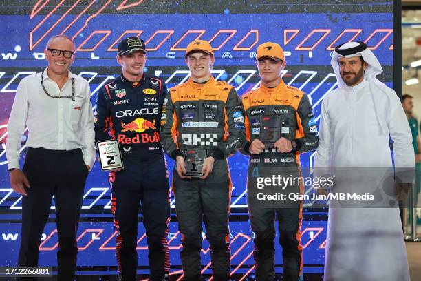 Stefano Domenicali of Italy and F1, Max Verstappen of the Netherlands and Oracle Red Bull Racing, Oscar Piastri of Australia and McLaren F1 Team,...