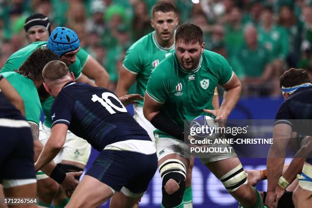 Ireland's lock Iain Henderson catches the ball out of a ruck to score a try during the France 2023 Rugby World Cup Pool B match between Ireland and...