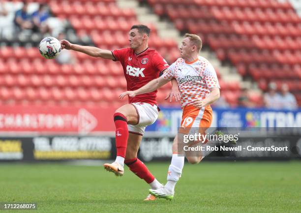 Charlton Athletic's Lloyd Jones and Blackpool's Shayne Lavery during the Sky Bet League One match between Charlton Athletic and Blackpool at Oakwood...