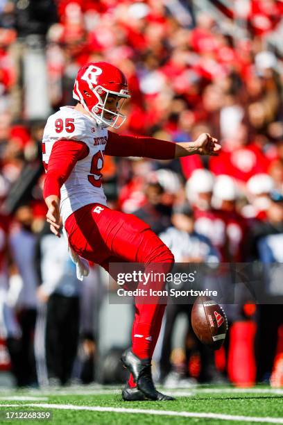 Rutgers punter Flynn Appleby punts the ball during a college football game between the University of Wisconsin Badgers and the Rutgers University...